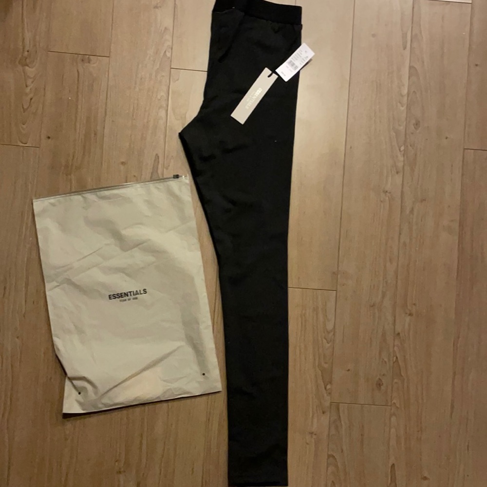 Stretch jersey leggings in black. High-rise. Tonal logo printed at leg.